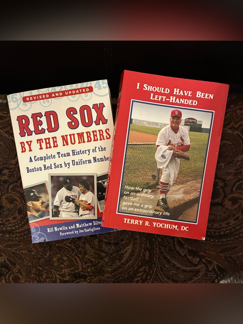 Bundle of two sports books. Autobio of Terry Yochum and Hx of the Red Sox by #.
